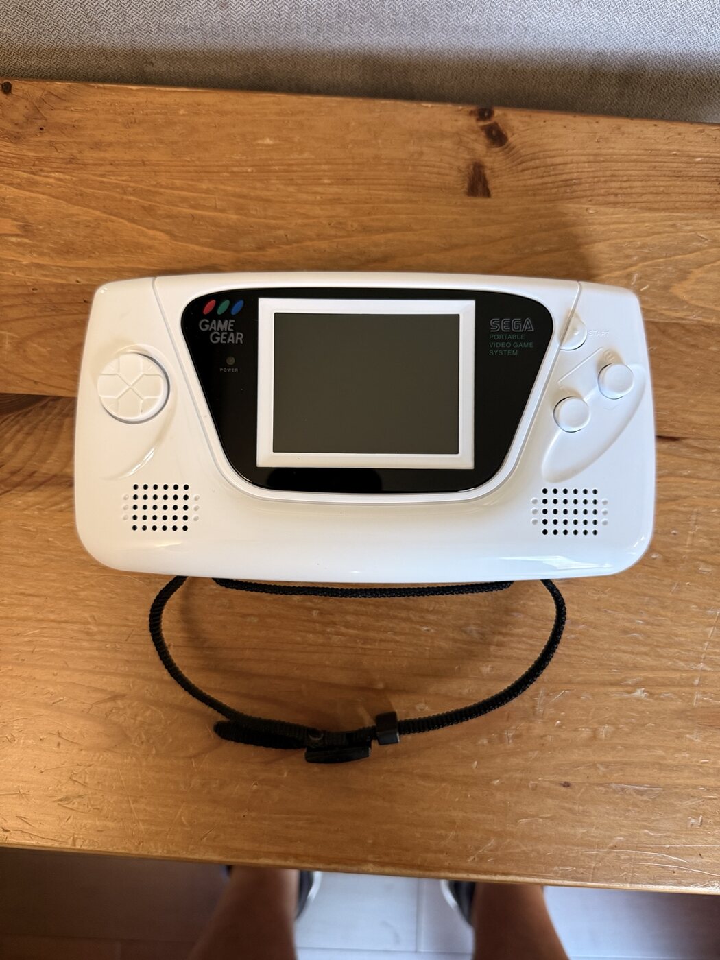 White re-shelled Sega Game Gear with a modern LCD installed